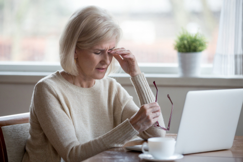 Woman Struggling with Eye Pain due to Bad Prescription