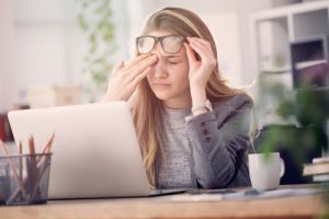 Woman suffering from eye strain