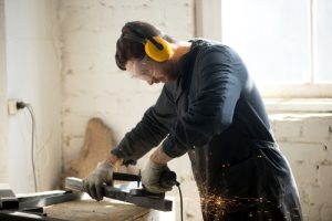 Worker using eye protection while working